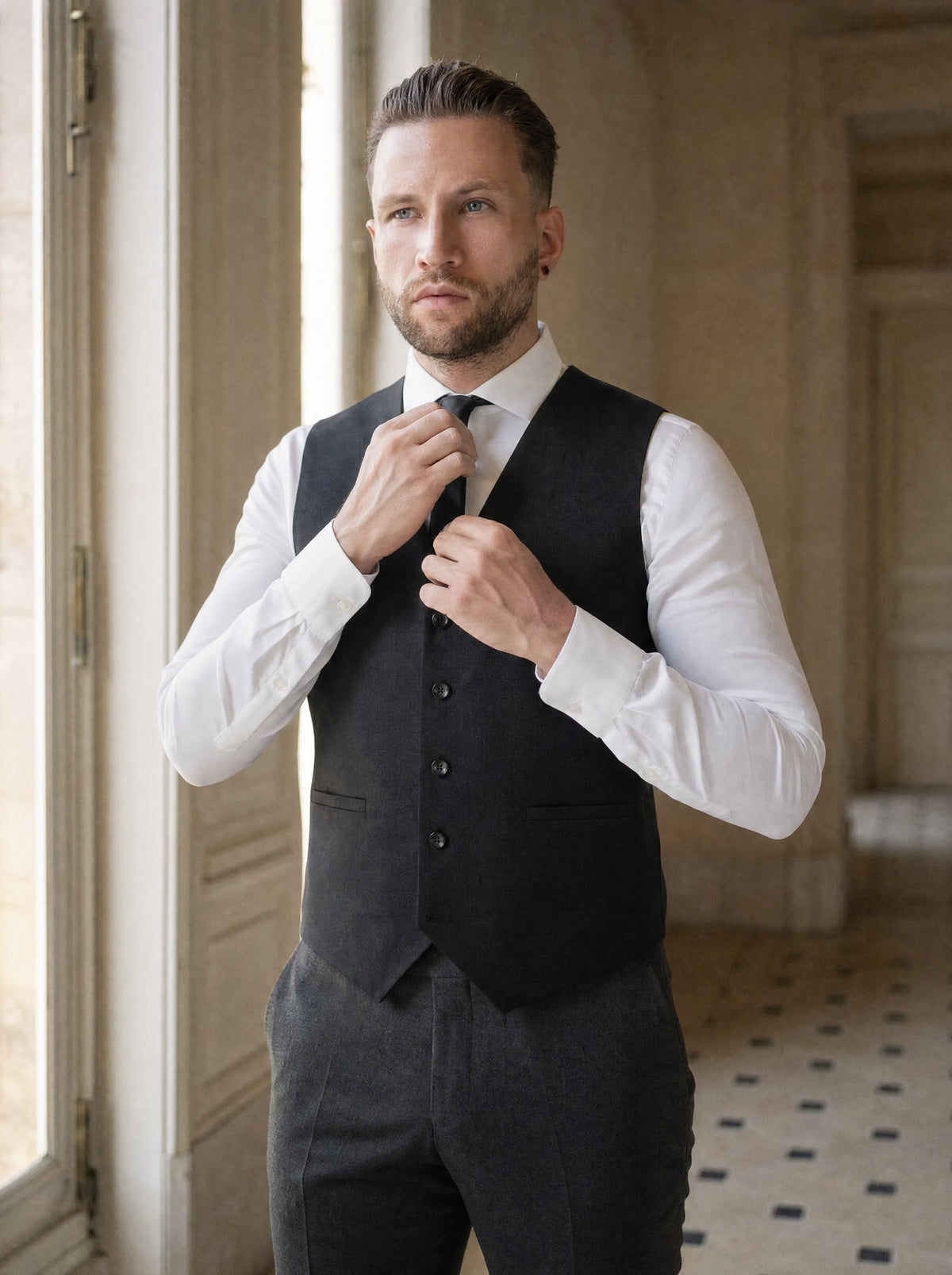 Shimmer Black Vest worn by a model, townhouse hotel hall780