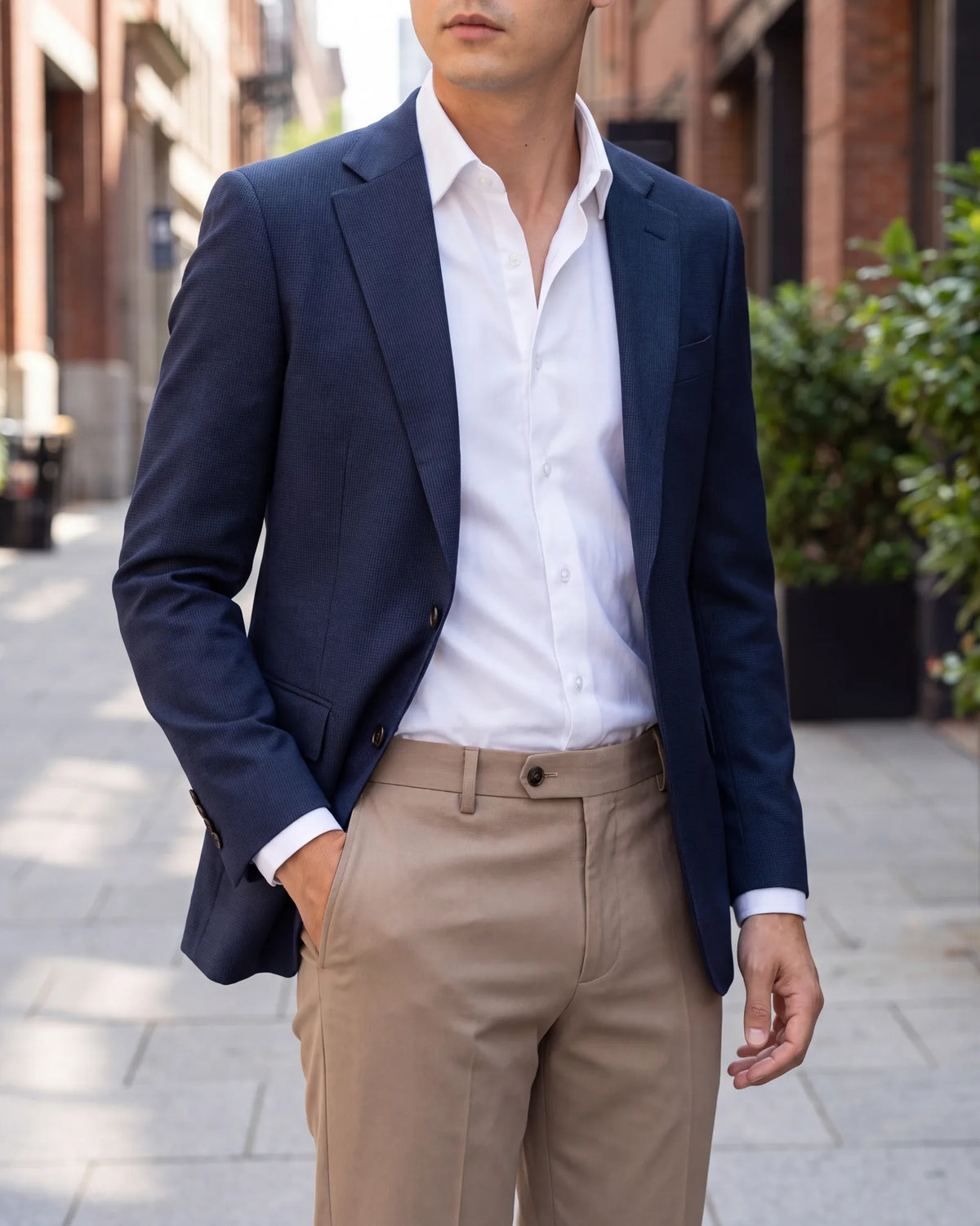 Get more use from a textured suit by splitting it. The jacket works over chinos, and the trousers work with a knit.