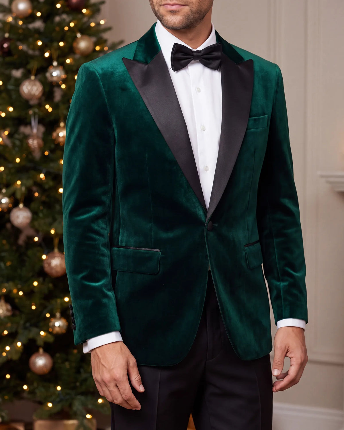 For a holiday party with a black tie code, pick a velvet tuxedo jacket in deep green.