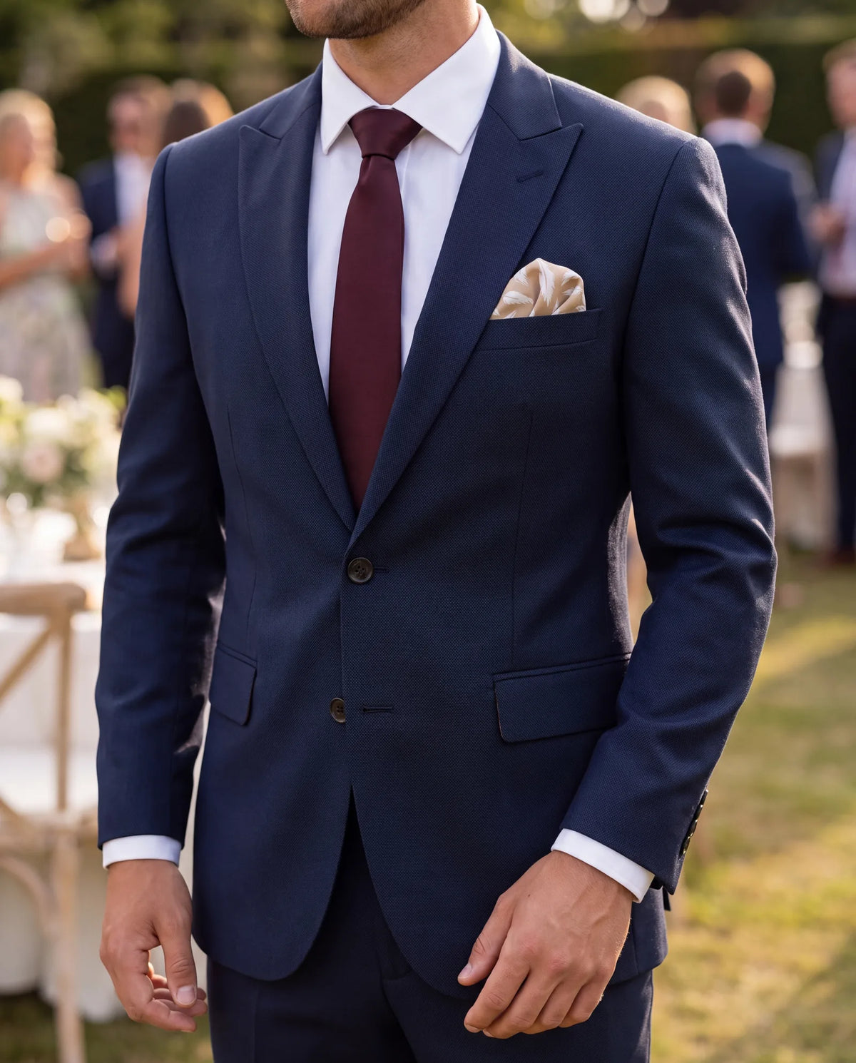 Keep away from the wedding party's exact colors. To nod to them, go one shade deeper with the tie or pocket square.