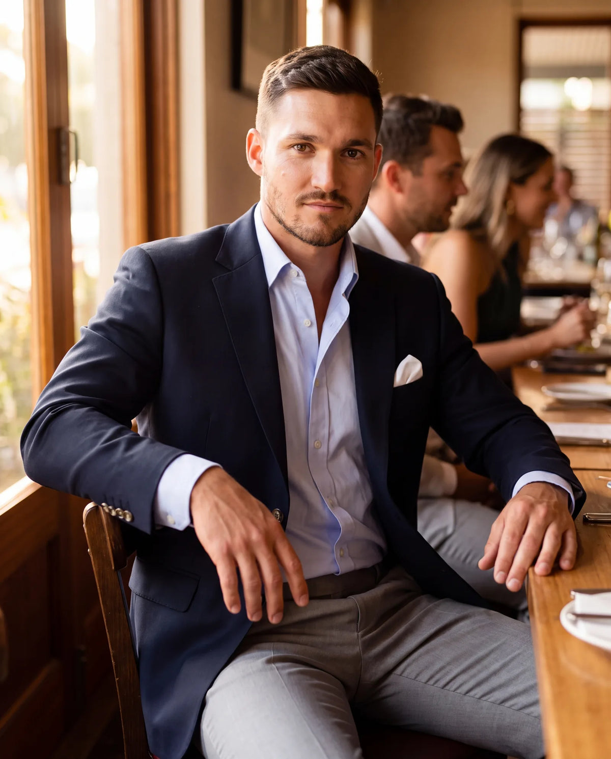 A jacket and trousers work for a rehearsal dinner, which is usually one step less formal than the wedding.