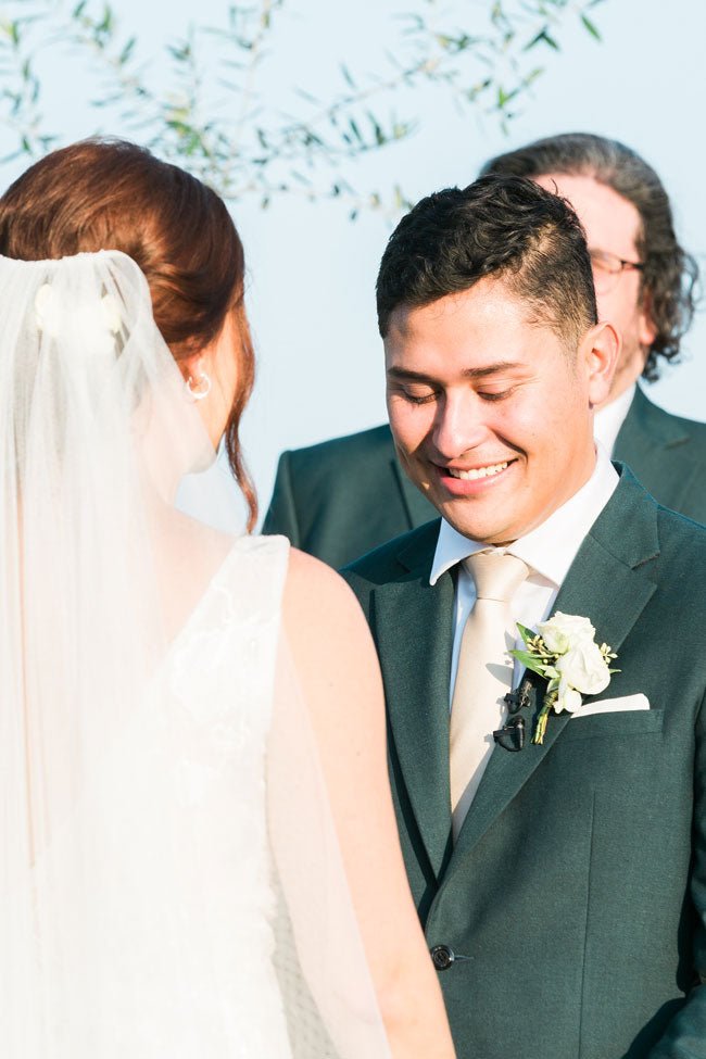 bride and groom close up of getting married at the alter