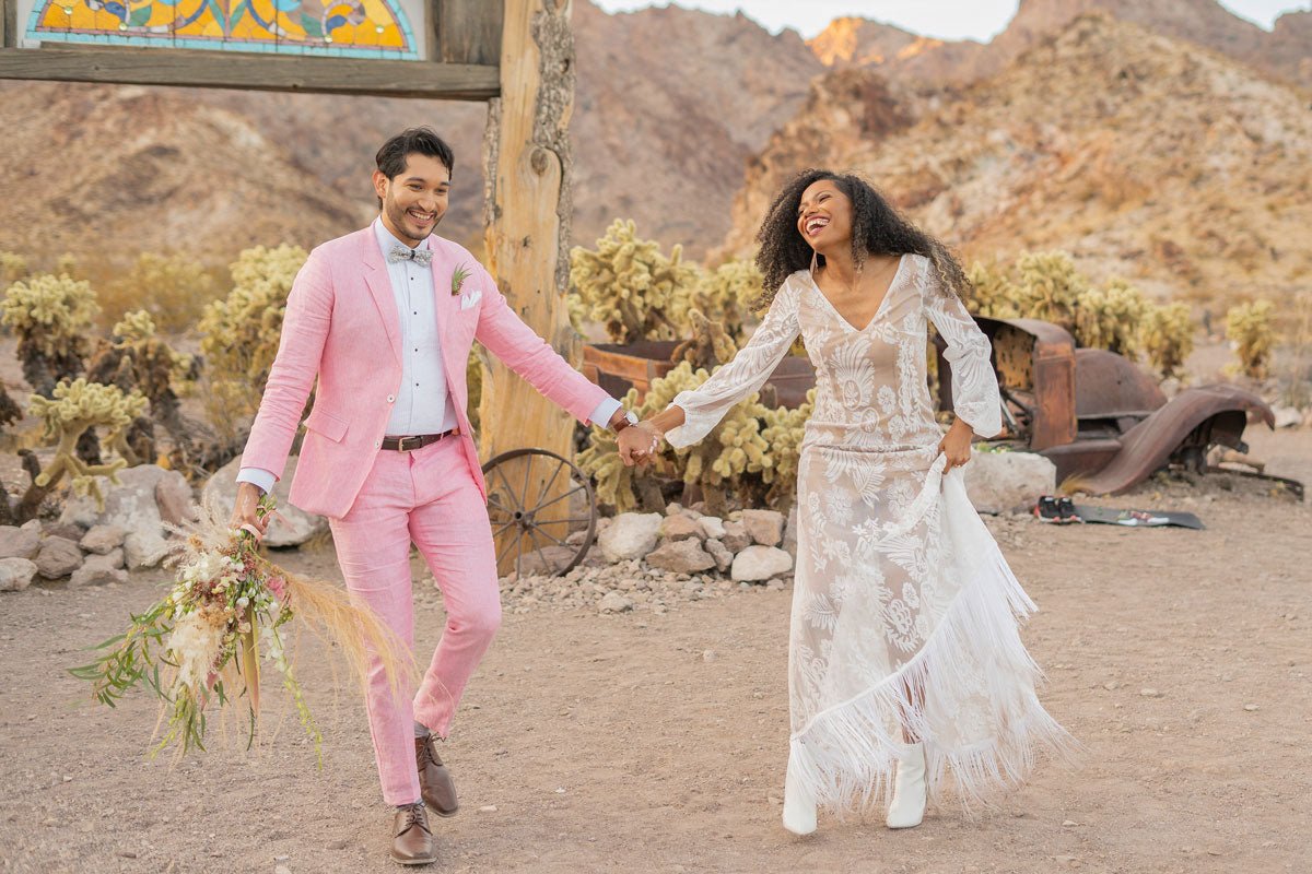 bride and groom holding hands in the midwest