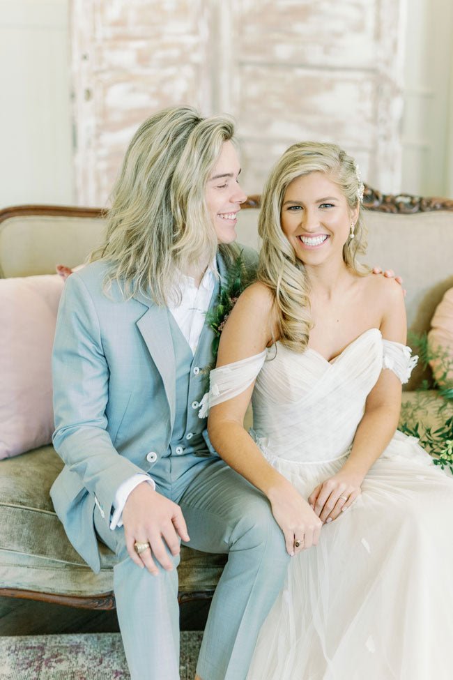 bride and groom in grey suit