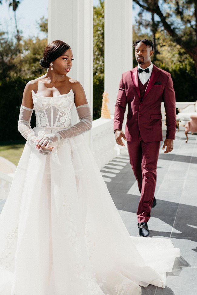wedding couple walking together outside
