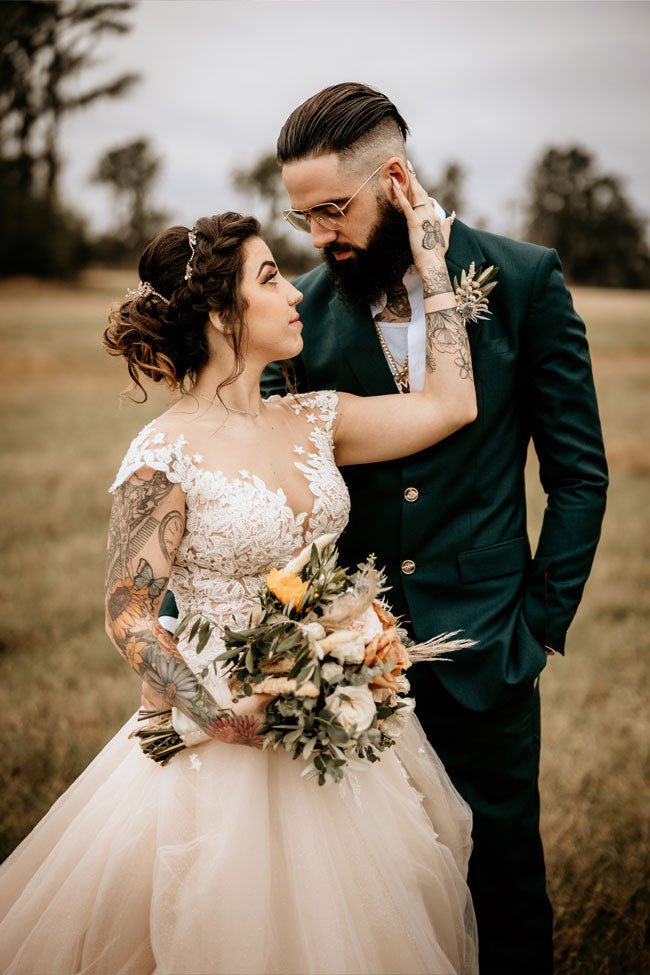 bride and groom in green suit