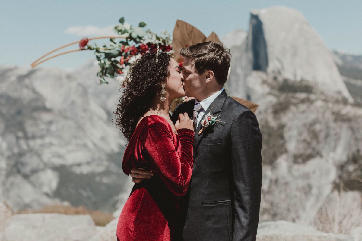wedding party cracking open beers while getting ready for the wedding