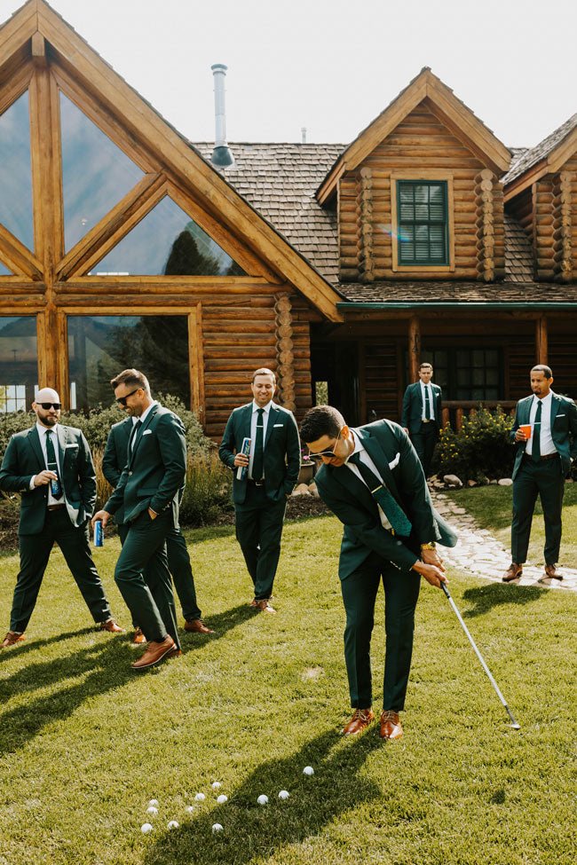 groomsmen playing golf while waiting for the wedding ceremony to start